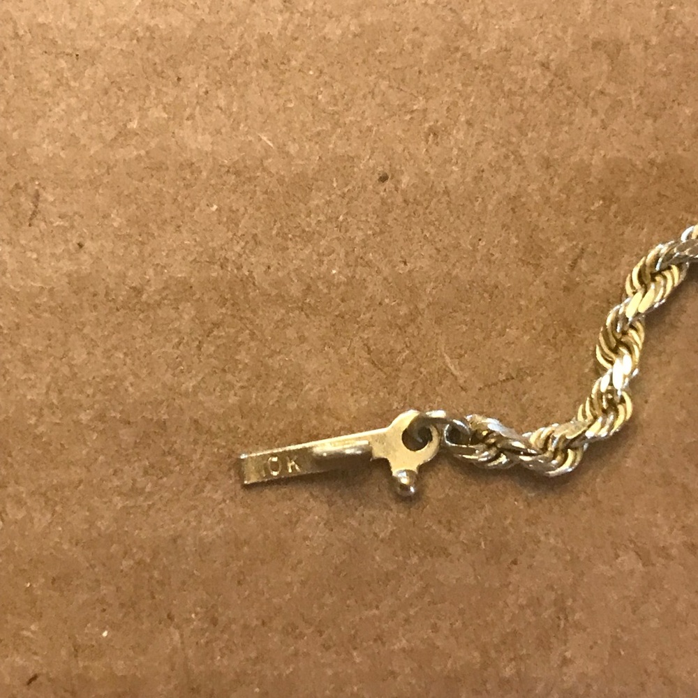 Gold rope type chain, with safety clasp. 10K gold. 20 inches long.